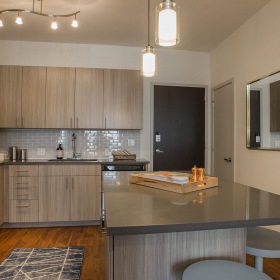 Kitchen with Island Straight View Interior of a Decatur Point Denver apartment residence.
